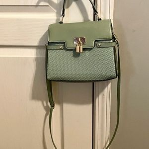 Green crossbody bag with handle on top